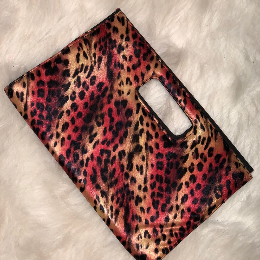 Red, creme and gold multi color clutch